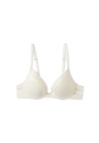 Soutien-gorge rembourré beige clair avec des bonnets lisses, des bretelles réglables et un design à double bande pour le soutien. Présente un léger éclat sur le tissu.