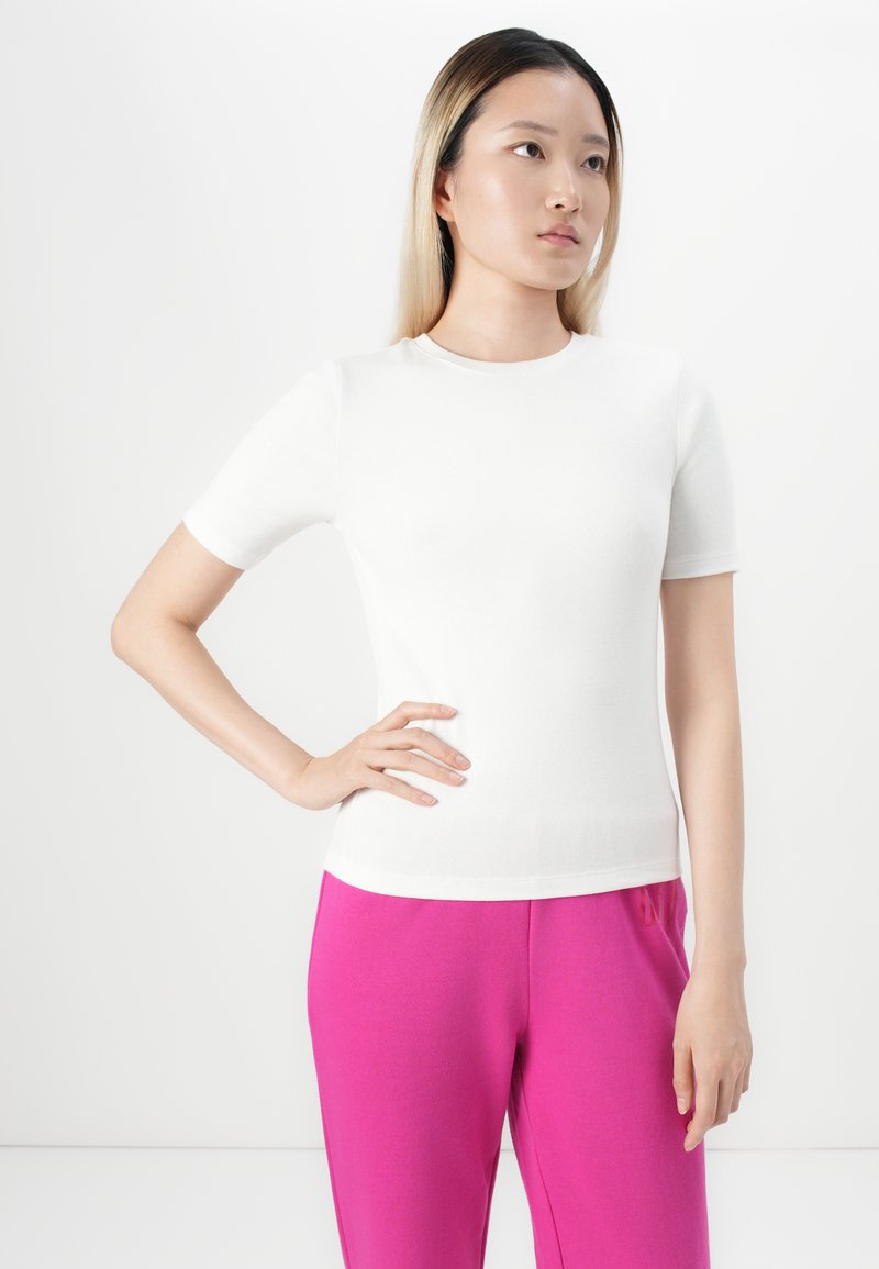 Pantalon femme rose à rayures coupe asymétrique – Shop
