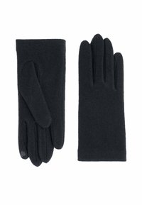 Une paire de gants en laine noire, l'un avec la paume vers le bas, l'autre avec le dos vers le haut, avec une extrémité compatible avec les écrans tactiles au bout de l'index.