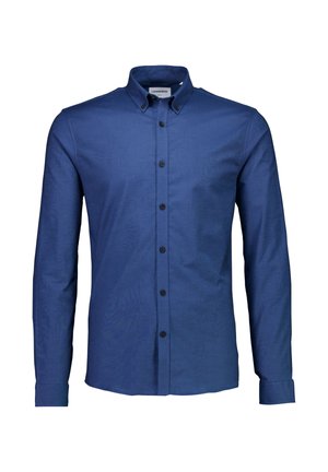 Långärmad, knapp-upp skjorta i mörkblått tyg. Har en knapp-ned krage och svarta knappar. Slät textur, skräddarsydd passform.