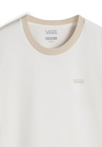 Light beige t-shirt with a cream color, ribbed neckline, and small embossed "VANS" logo on the chest. Made from 100% cotton.