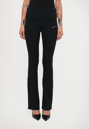 PERFORMANCE - Leggings - Trousers - black