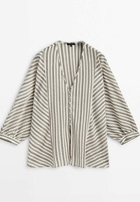 Blouse beige et marron à rayures verticales avec col en V, manches longues bouffantes et fermeture boutonnée à l'avant.