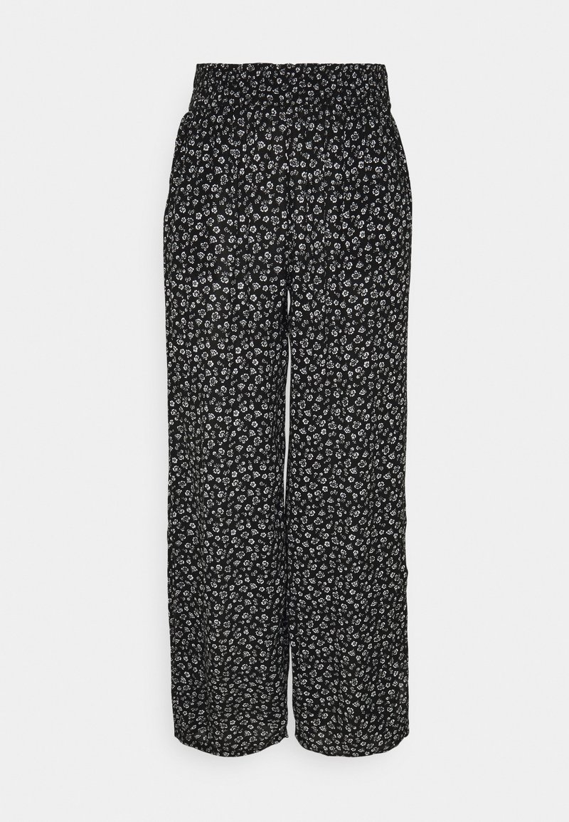 Pantalon noir à jambes larges avec motif floral blanc, taille élastique, tissu léger et coupe fluide.