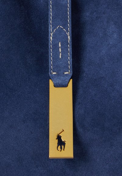 Navy suede material with a gold rectangular clasp. Clasp features a small, embossed logo of a horseman. Visible stitching details.