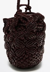 Dark brown woven leather bucket bag with drawstring closure and textured braided design.
