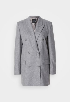 Blazer grigio doppiopetto con un tessuto strutturato, rever a 