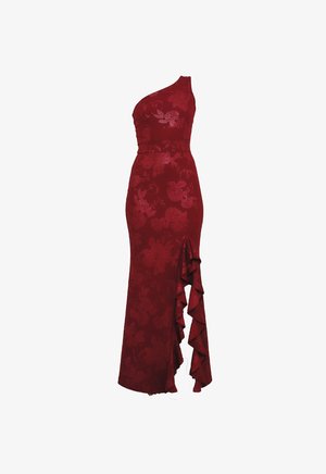 Piros egyrészes ruha virágmintával, testhezálló felső résszel és fodros részlettel az oldalsó hasítéknál. Texturált anyagból készült, hogy illeszkedő sziluettet biztosítson.