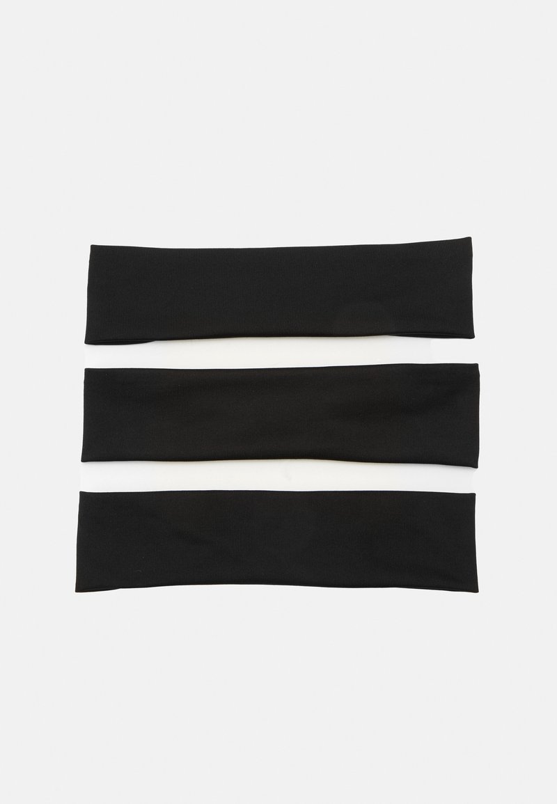 Set of three elastic headbands in black and white, with a smooth texture and a simple, flat design. Each band is uniform in width.