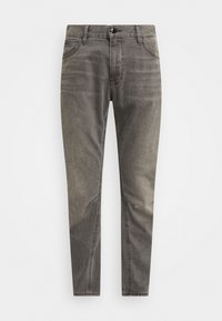 Šedé denimové slim-fit džíny s pěti kapsami, zapínáním na knoflíky a jemným odřením. Obsahují švy na kolenou a mají čistý střih.