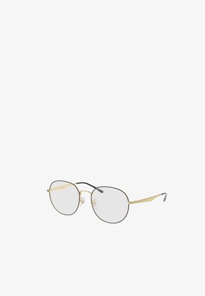 Dünne Gold Metallbrille mit runden klaren Gläsern, schwarzen Bügelenden und verstellbaren Nasenpads auf weißem Hintergrund.
