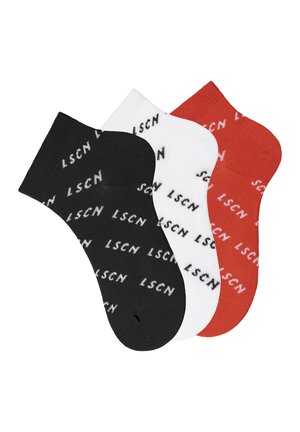 Three pairs of ankle socks in black, white, and orange, featuring the text "LSCN" in a repeated pattern. Made from a stretchy fabric.