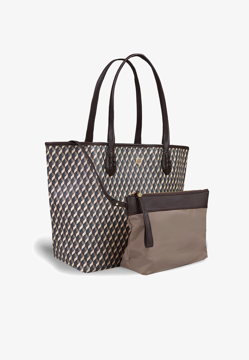 Sac fourre-tout avec un motif géométrique en bleu foncé, crème et marron. Doté de poignées en cuir marron et d'une pochette zippée beige amovible.