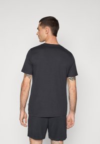New Balance GRAPHIC  - Sportfelső - black