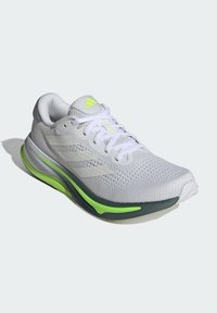 adidas Performance SUPERNOVA SOLUTION - Chaussures de running sur route - cloud white metalic lucid lemon