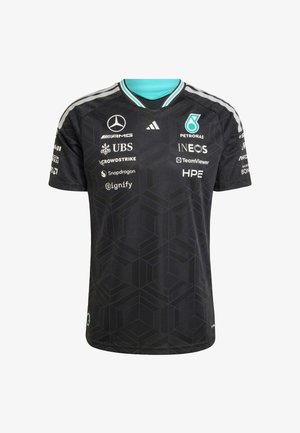 Maillot de sport noir avec un motif géométrique, des accents turquoise sur le col, et plusieurs logos de sponsors imprimés sur le tissu.
