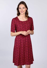 Rotes Blumenkleid mit kurzen Ärmeln und quadratischem Ausschnitt, mit einem taillierten Oberteil und einem ausgestellten Rock. Weicher Stoff mit einem strukturierten Muster.
