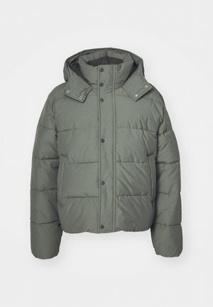 Green puffer jacket with a hood, made of quilted fabric. Features snap buttons, side pockets, and a textured finish.