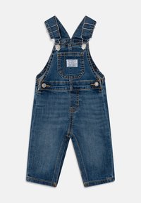 Džínové lacláče s nastavitelnými ramínky, čtvercovou náprsní kapsou a kontrastním prošitím. Střední modrý odstín s pevnou strukturou.