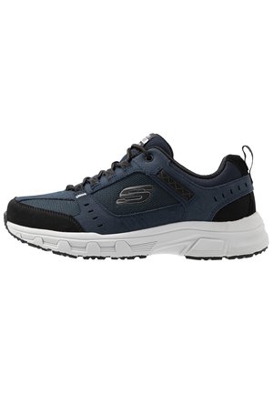 Men's athletic shoe in navy mesh and suede. Features black accents, grey laces, and a white sole with a textured pattern.