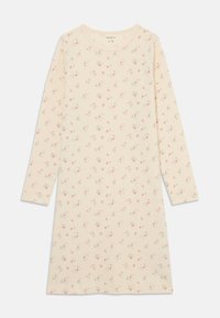 Vestido de manga larga en suave algodón crema con pequeño estampado floral en rosa. Presenta un escote redondo y un ajuste holgado.