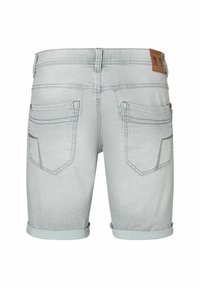 Light grey denim shorts with rolled cuffs, two rear pockets, and branded leather patch at waistband. Smooth texture and casual design.