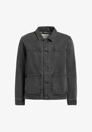 Zwarte spijkerjasje met knoopsluiting aan de voorkant, kraag, lange mouwen en twee grote voorzakken.