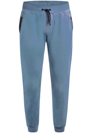 Pantalones de chándal azul claro con cinturilla elástica, detalles negros en los bolsillos y puños acanalados. Fabricados con un tejido suave y cómodo.