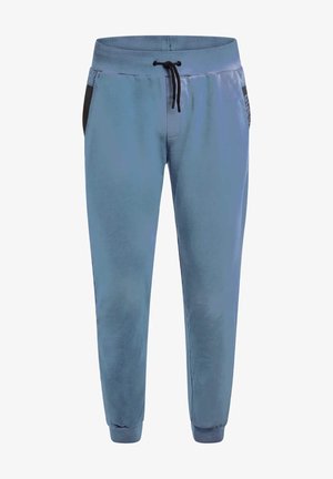 Pantalones de chándal azul claro con cinturilla elástica, detalles negros en los bolsillos y puños acanalados. Fabricados con un tejido suave y cómodo.