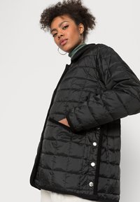 Weekday WHITNEY RIDING JACKET - Casaco leve - tar black