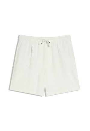 Pantaloncini in spugna bianca con elastico in vita e coulisse, con tasche frontali e vestibilità comoda.