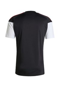 Black short-sleeve sports shirt with white sleeves and thin red stripes along the shoulder seams, shown from the back.