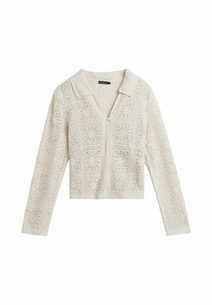 Kremowy, szydełkowany sweter z długim rękawem, kołnierzykiem, zamkiem błyskawicznym z przodu oraz kwadratowymi kwiatowymi wzorami na całej tkaninie.