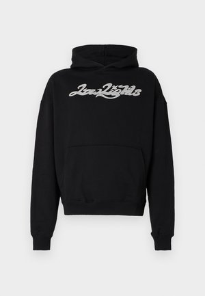 Sweat à capuche noir avec poche kangourou à l'avant et texte argenté pailleté "Low Lights" sur la poitrine en police cursive stylisée.