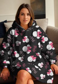 Felpa con cappuccio caratterizzata da uno sfondo nero con motivi di Minnie Mouse bianchi e rosa, compresi cuori e testo "Minnie xoxo".
