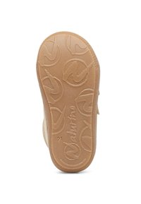 Béžová gumová podešev s texturovaným vzorem a vyraženým logem. Hladký povrch s zaoblenými okraji a jemným lesklým povrchem.