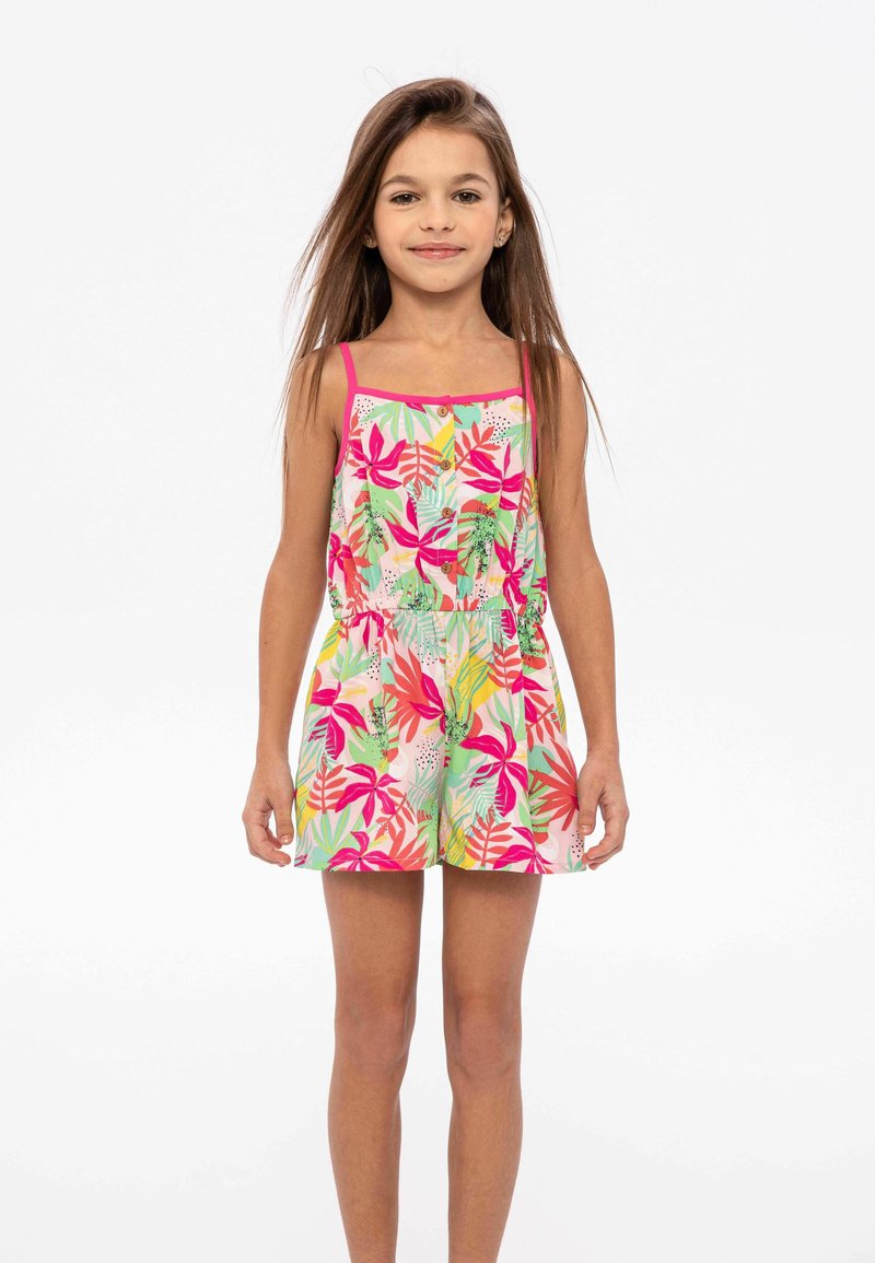 Combinaison fleurie avec des bretelles roses, motif de feuilles tropicales vibrantes en verts, roses et jaunes, taille élastique et détails de boutons.
