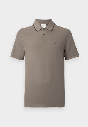 Taupe short-sleeve polo shirt with black-trimmed collar, two-button placket, and small embroidered "cK" logo on the left chest.