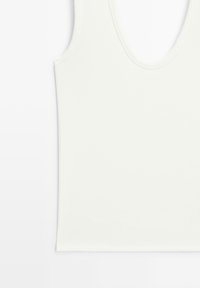 White sleeveless tank top with scoop neckline, smooth fabric, and straight hem, laid flat on a white background.