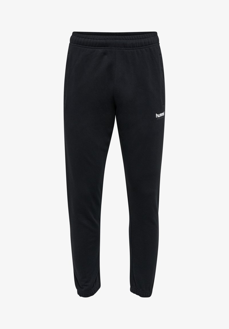 Schwarze Sweatpants mit elastischem Bund, seitlichen Taschen und einem weißen Logo auf dem linken Oberschenkel. Angenehme Textur mit schmal zulaufender Passform.