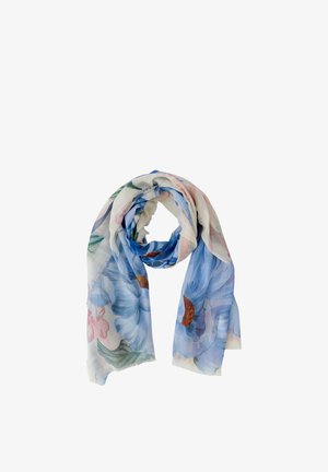 Écharpe légère et transparente avec de grands motifs floraux bleus et roses, pliée en vrac sur un fond blanc.