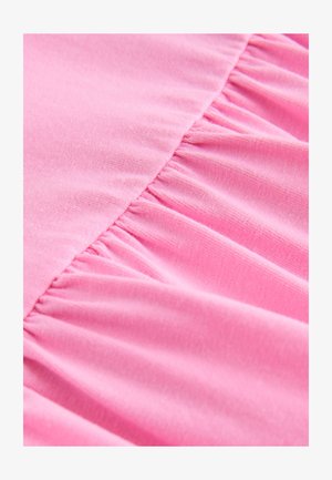 Pink fabric showing gathered texture along a seam, smooth finish, and soft, lightweight material. All elements are uniform in color.