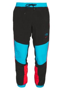 Pantalones de felpa negros con paneles en bloques de color azul y rojo, cintura elástica con cordón ajustable y puños ajustados en los tobillos.