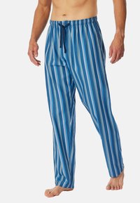 Blå randiga pyjamabyxor med elastisk midja och dragsko, raka ben och mjukt bomullsmaterial.