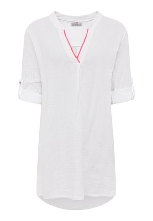 White textured women's blouse with rolled-up sleeves, V-neckline with pink trim, and button tab detail on sleeves.