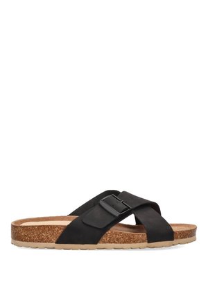 Sandalia negra de deslizar con correas entrecruzadas, hebilla negra ajustable, plantilla de corcho y suela de goma texturizada. Diseño casual para mayor confort.