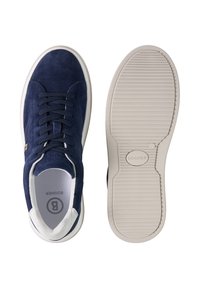 Navy blue suede sneaker with white sole, laces, and branded insole, shown from top and sole views against a white background.