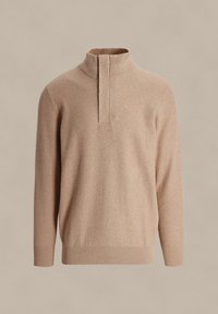 Beżowy sweter z pół-zamkiem, wykonany z teksturowanej dzianiny, z długimi rękawami oraz ściągaczami w mankietach i na dolnym końcu. Minimalistyczny design.