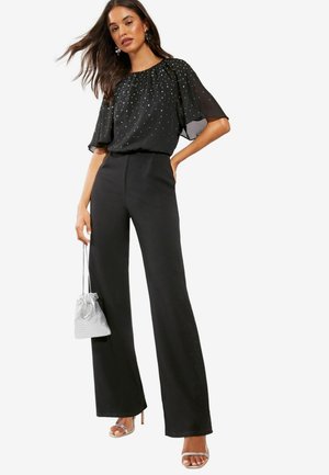 SPARKLY FLUTTER SLEEVE -REGULAR FIT - Jumpsuit - black