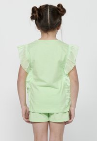 Koroshi Linne - lima lime green